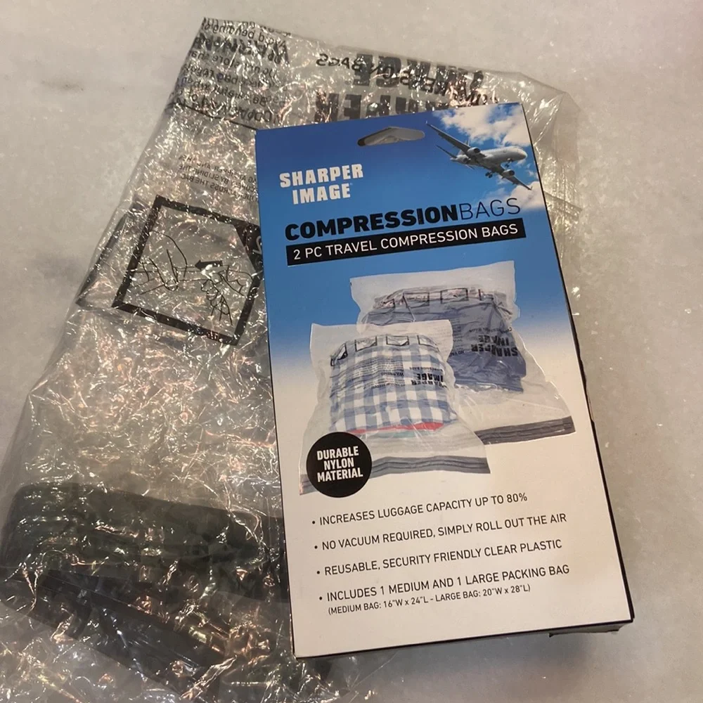 New in box + 1 bonus sharper image 2-piece compression bags